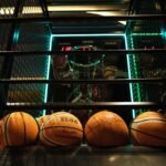 Close-up of basketballs at an arcade-style basketball hoop game