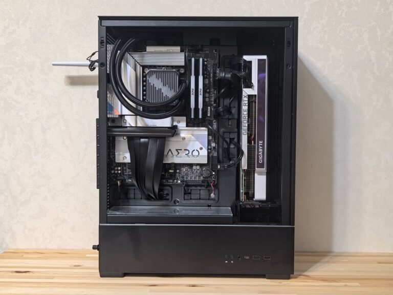 Custom-built gaming PC interior showing GPU and cooling system components
