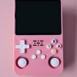 Handheld retro gaming device with directional pad and buttons