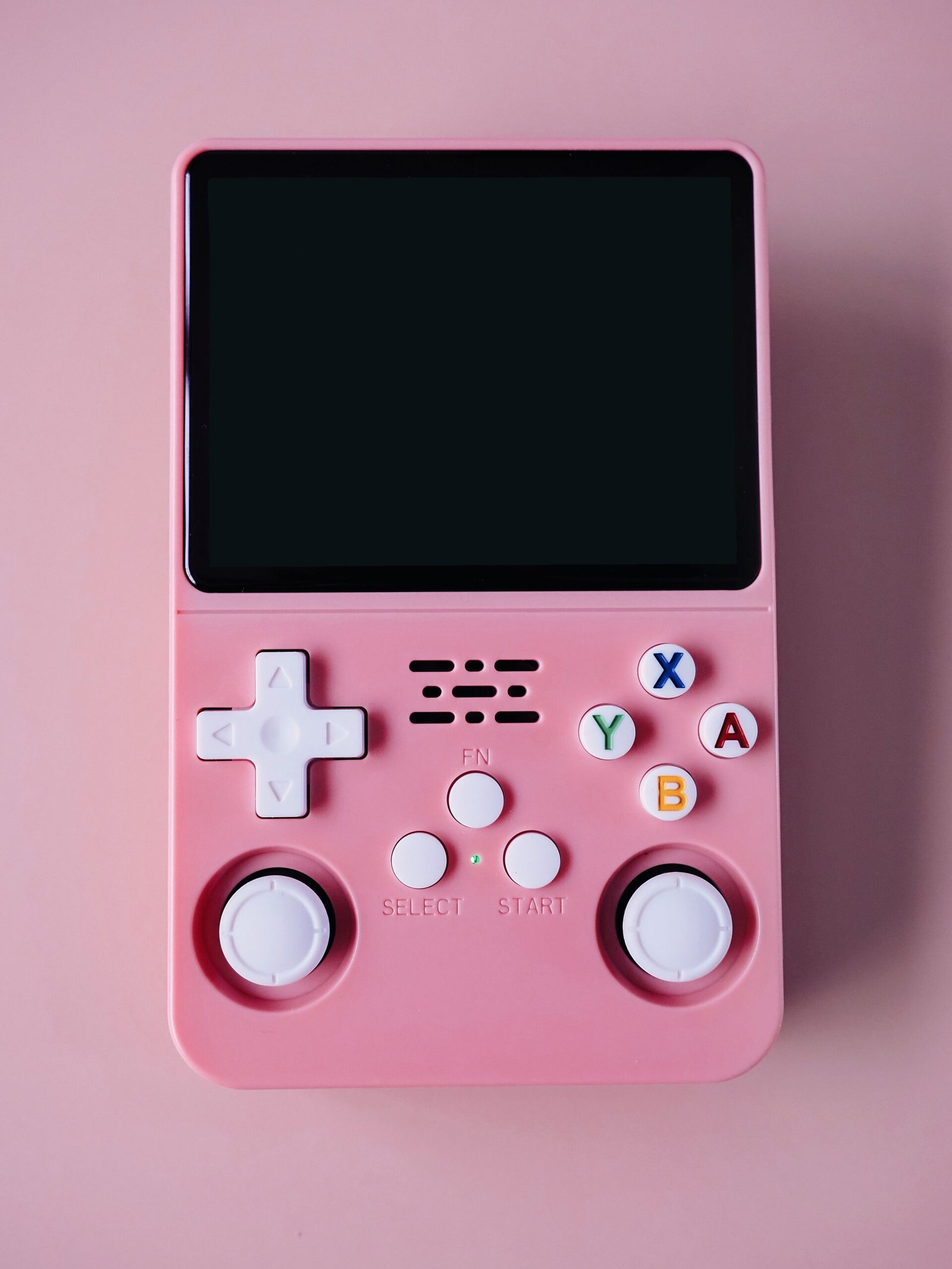 Handheld retro gaming device with directional pad and buttons