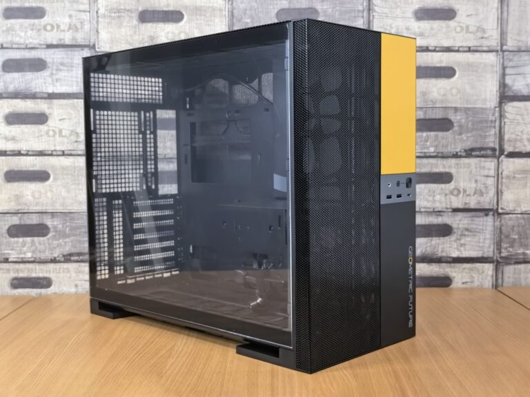 Wide gaming monitor displaying sharp graphics in a dark room