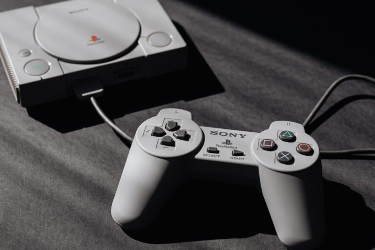 Retro Sony PlayStation console with classic controller