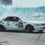 Cars competing in a fast-paced racing and crash arena