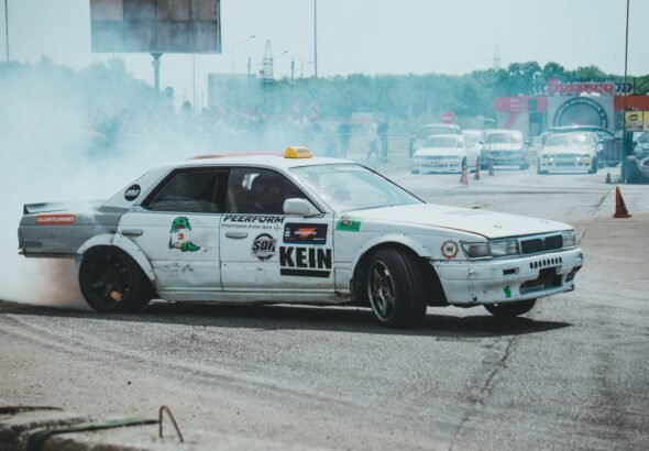 Cars competing in a fast-paced racing and crash arena