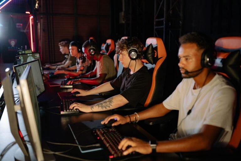 Group of young esports players competing seriously in a tournament setting