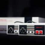 Classic Nintendo console and controller setup evoking GameCube and Wii era gaming