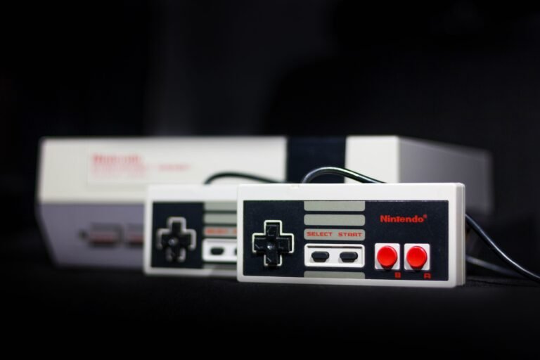 Classic Nintendo console and controller setup evoking GameCube and Wii era gaming