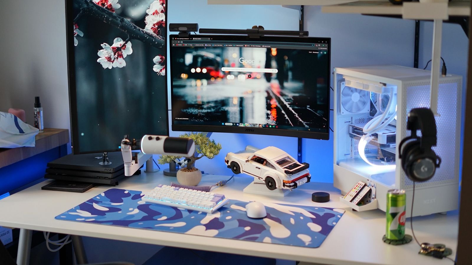 Fantasy RPG style PC gaming setup with dual monitors