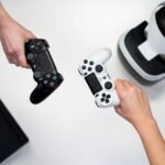 Game controller resting near a gaming console
