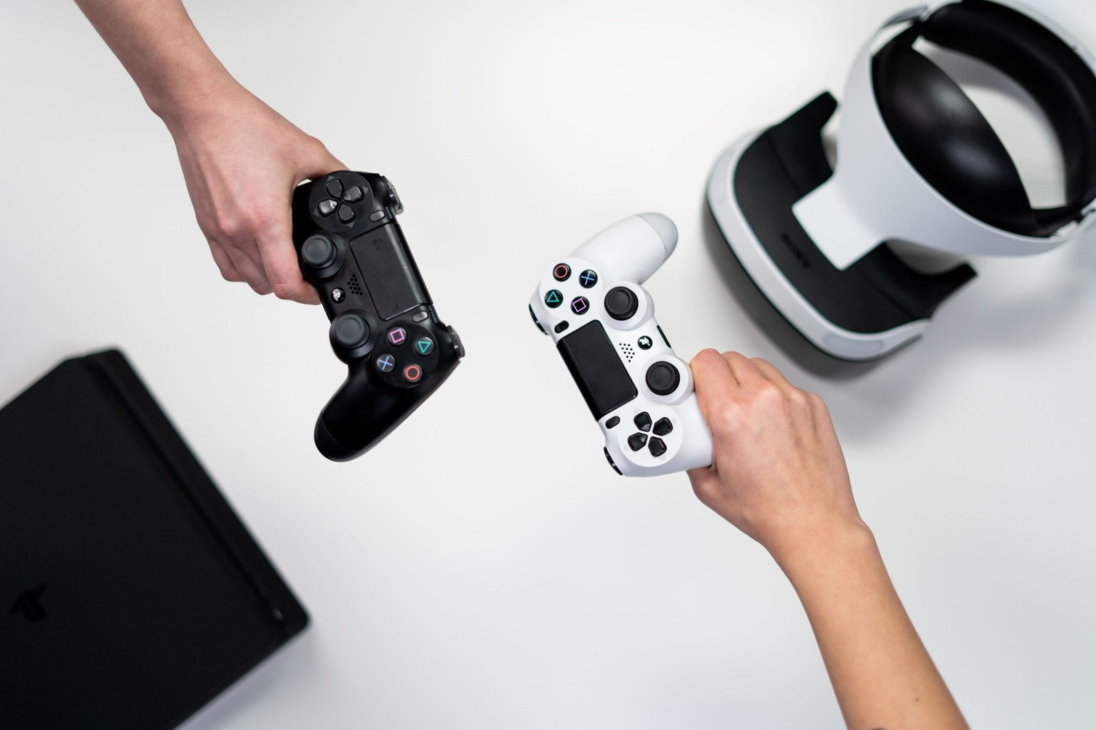 Game controller resting near a gaming console