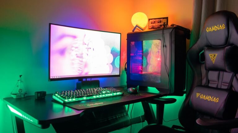 Gaming chair in a dark RGB-lit gaming room, similar to the Symino gaming chair