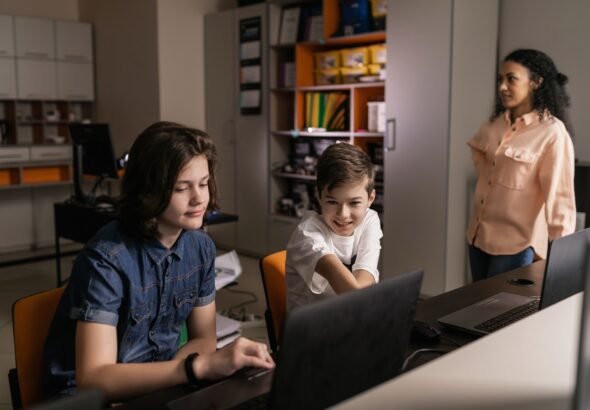 Students playing unblocked games for Chromebook during a school break in the classroom