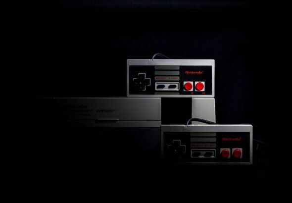Nintendo console and controller setup on a shelf