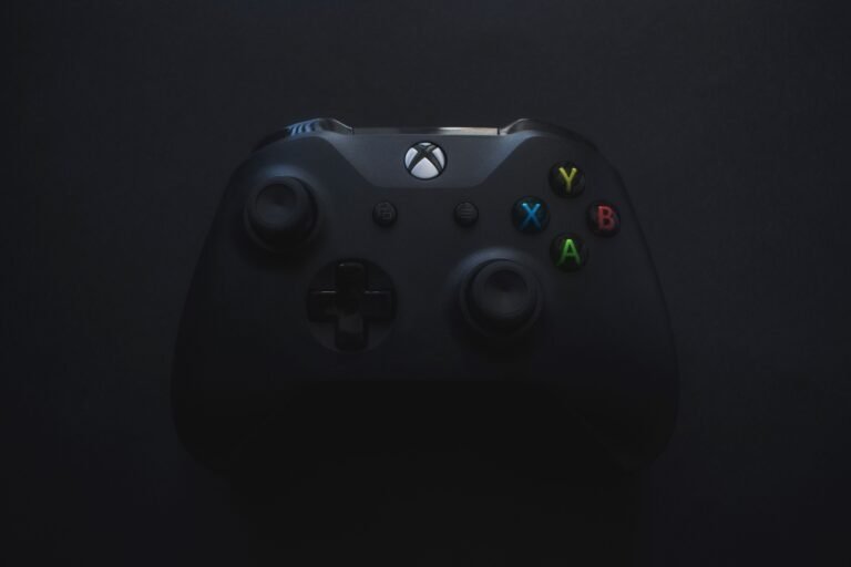 Xbox controller illuminated against a dark background